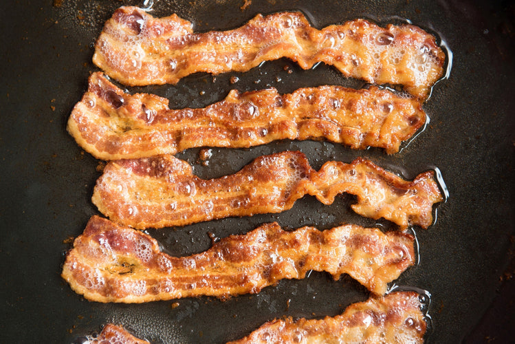 well arranged fried bacons