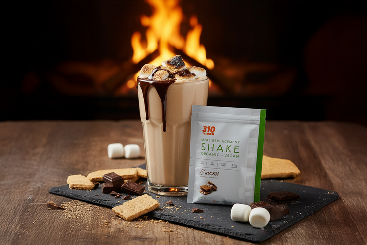 310 S’mores Shake topped with toasted marshmallows, chocolate drizzle, and graham crackers by fire.