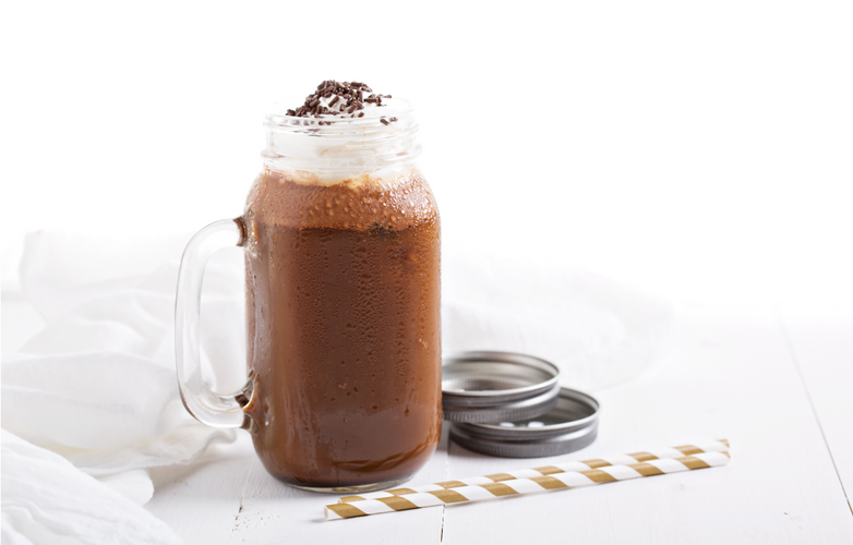 Chocolate coffee milk shake with whipped cream and sprinkles
