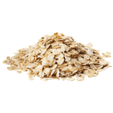 Small pile of light brown, flat, and irregularly shaped rolled oats.