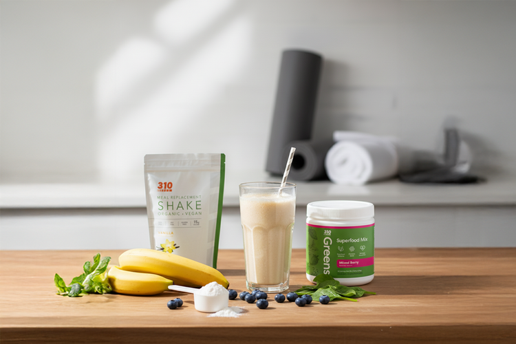 310 Vanilla Shake blended with superfoods, banana, spinach, and berries for a recovery smoothie.