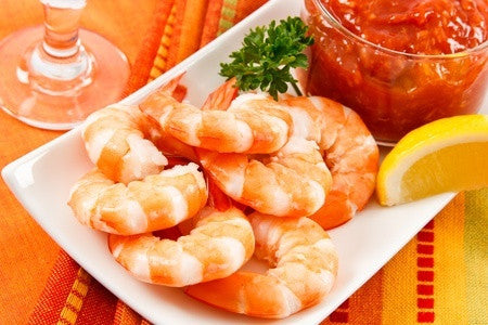 shrimp dish on a white plate