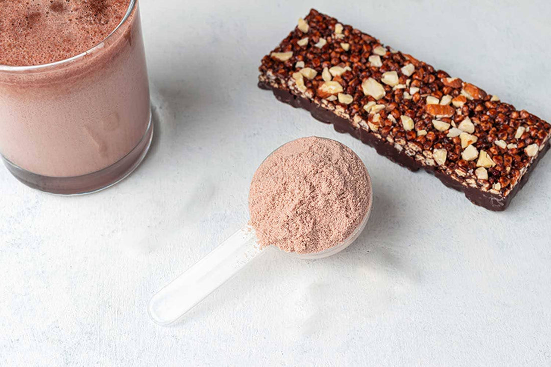 scoop of protein powder and a protein bar