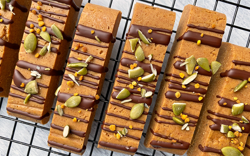 pumpkin keto bars on grey table