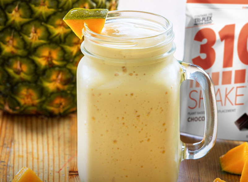 mango protein shake smoothie in a mason jar
