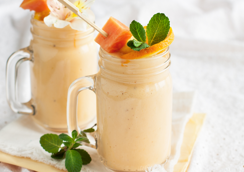 tropical papaya smoothie in a mason jar