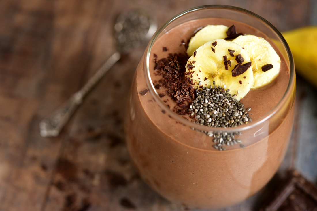 banana mocha shake topped with sliced banana and chia seeds