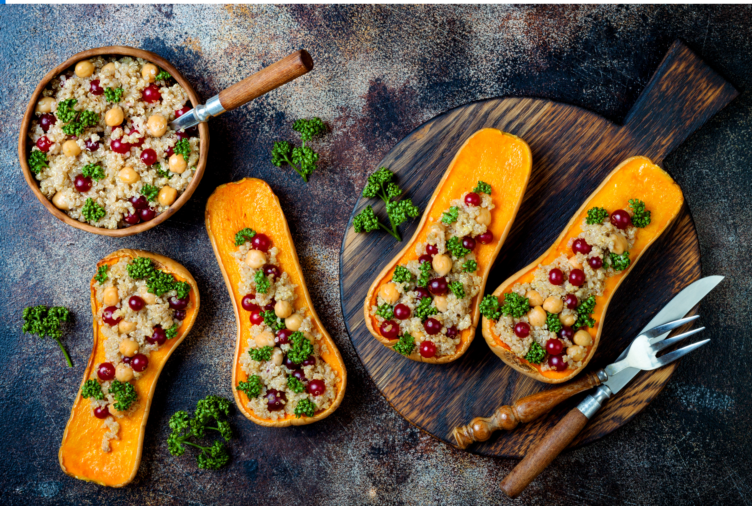 stuffed butternut squash on dark cutting board