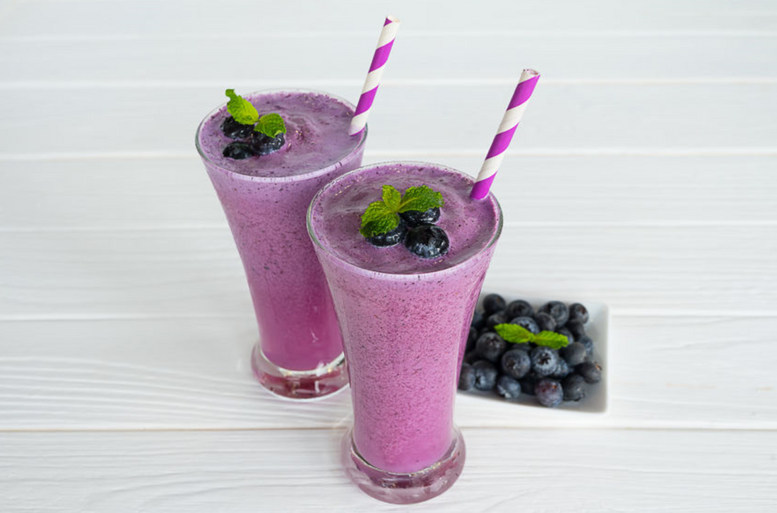 blueberry pear ginger smoothie in tall glasses