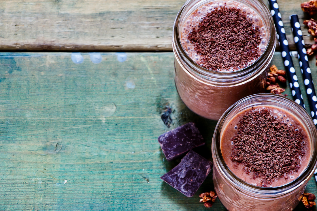 creamy chocolate shake with cacao nibs on top