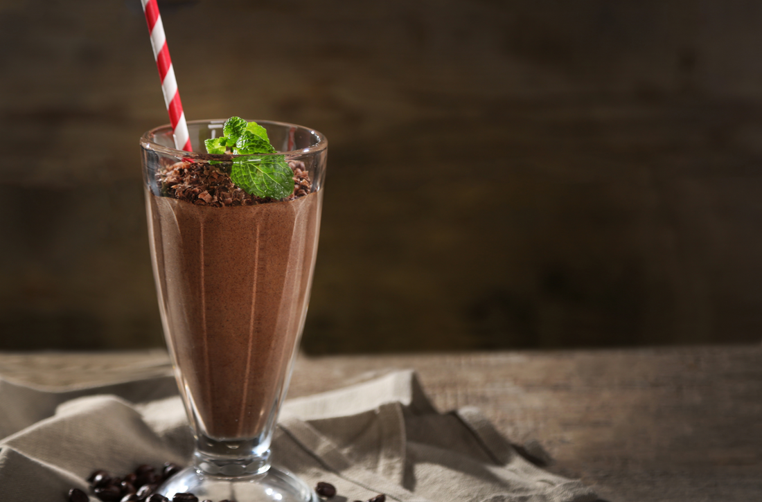 Chocolate cocktail on wooden background