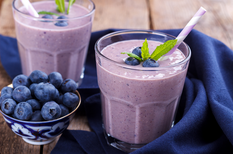 lemon blueberry cheesecake shake with fresh blueberries