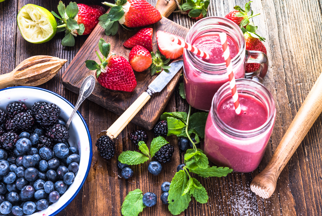 Preparation of mixed berry smoothie in mason jars