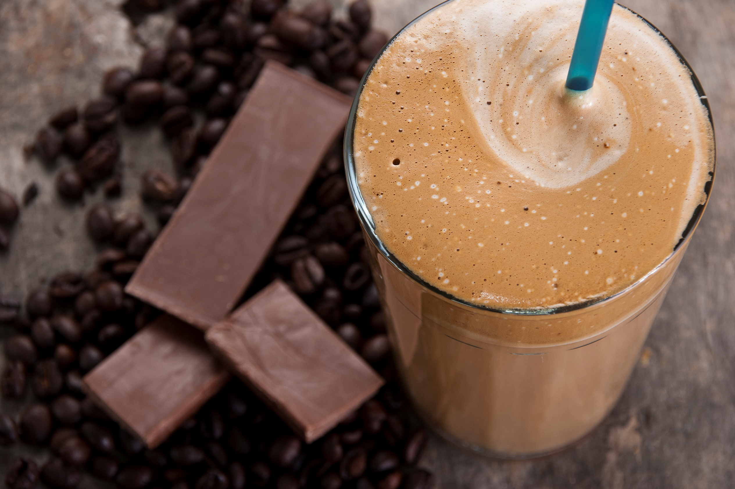 overhead view of a glass of chocolaty coffee 