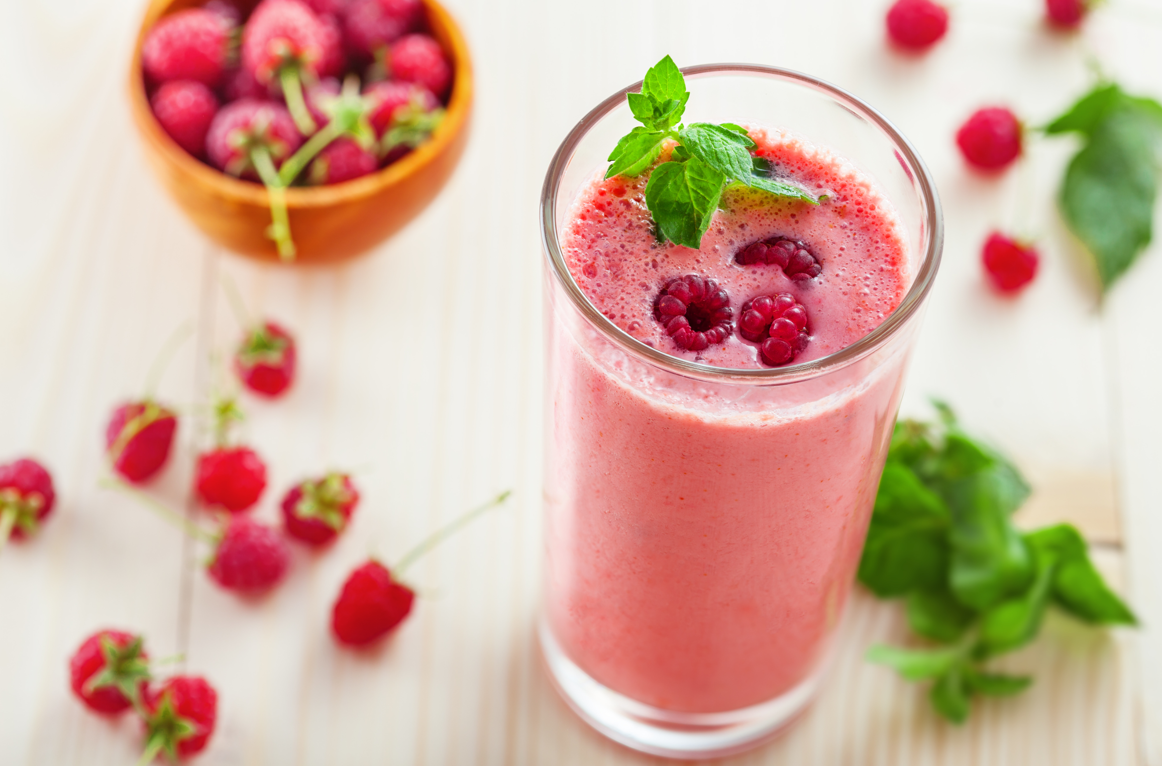 Fruit smoothie drink made of fresh raspberry and mint