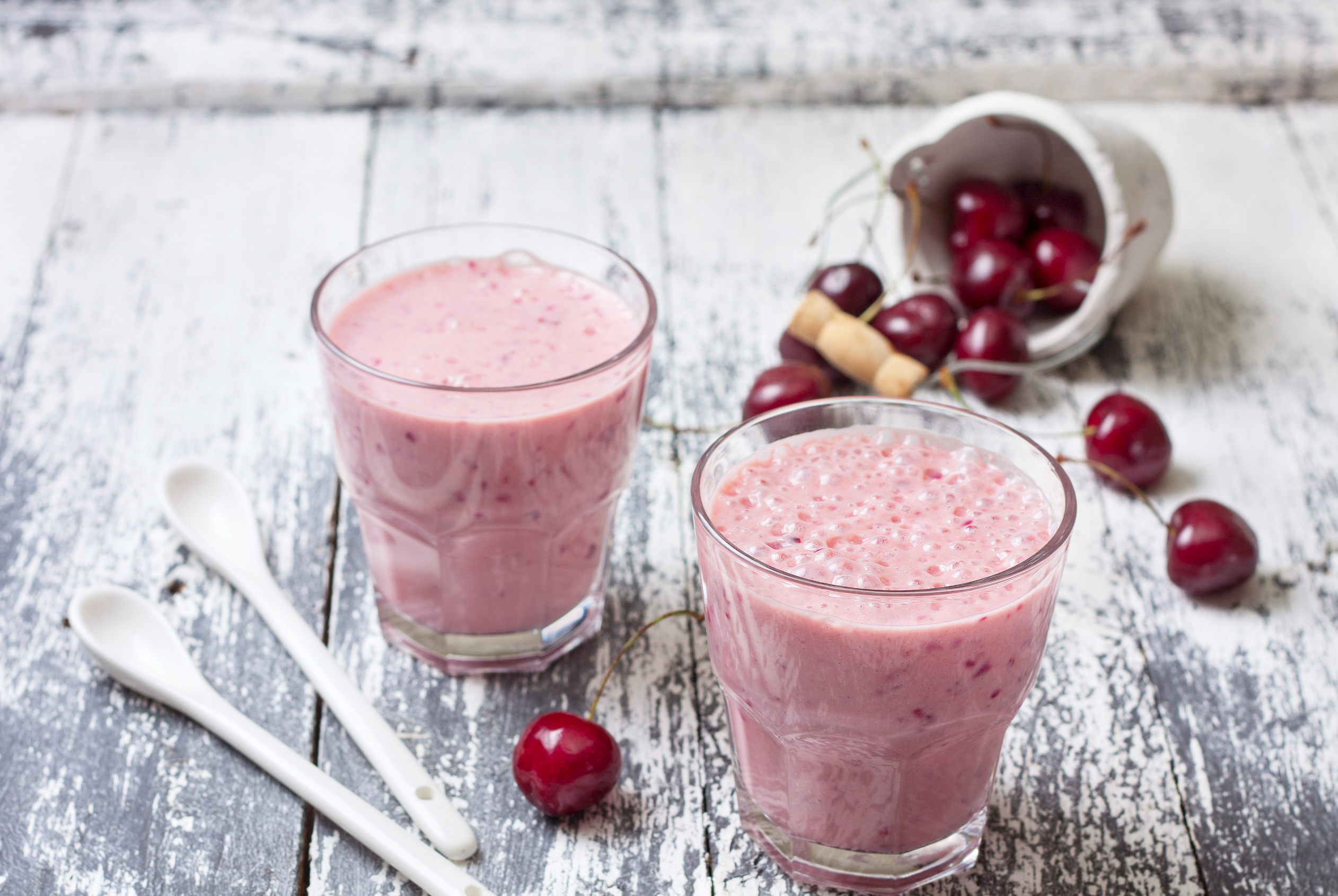 two glasses of slushee and some fresh berries