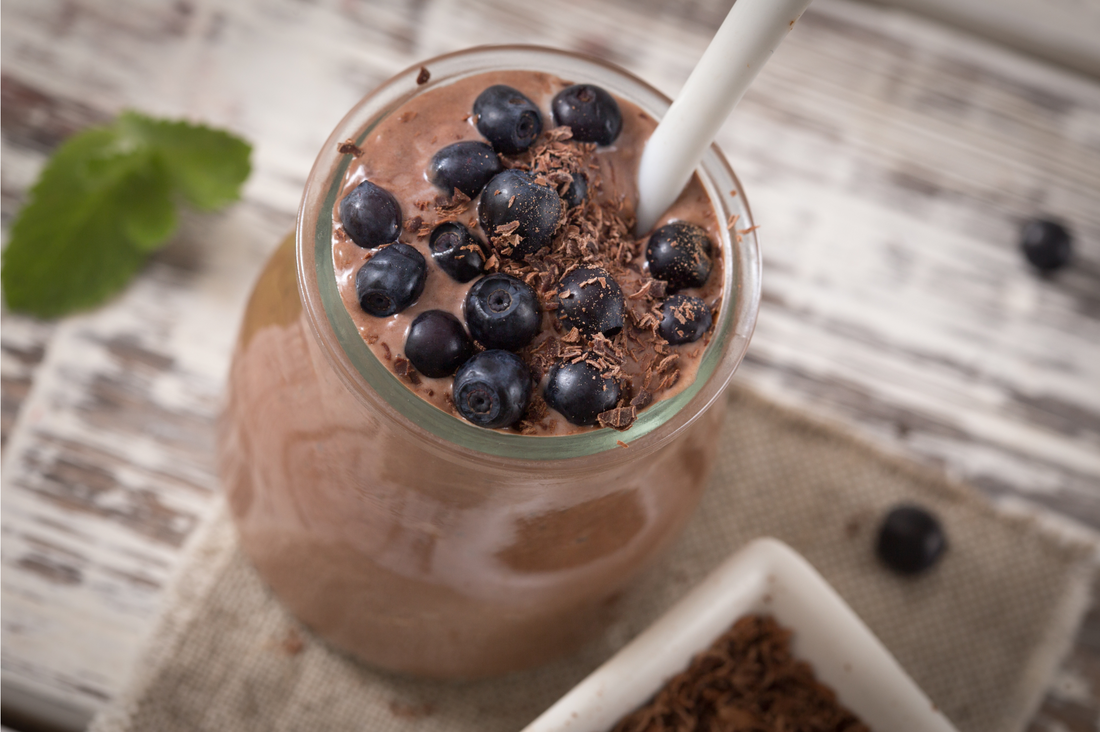 Healthy breakfast with blueberries, chocolate smoothie