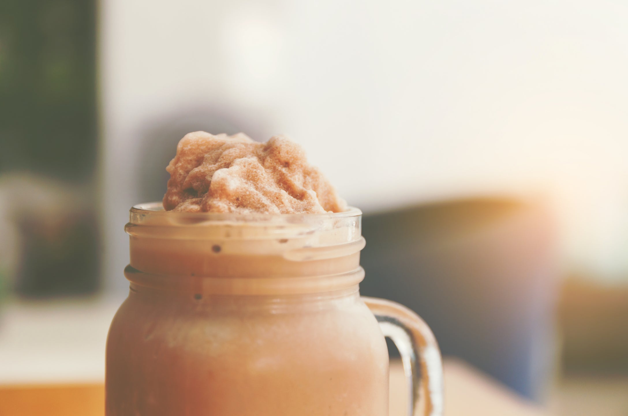 Top of chocolate smoothie in giant glass