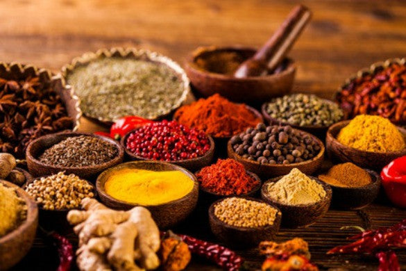 small bowls of different spices
