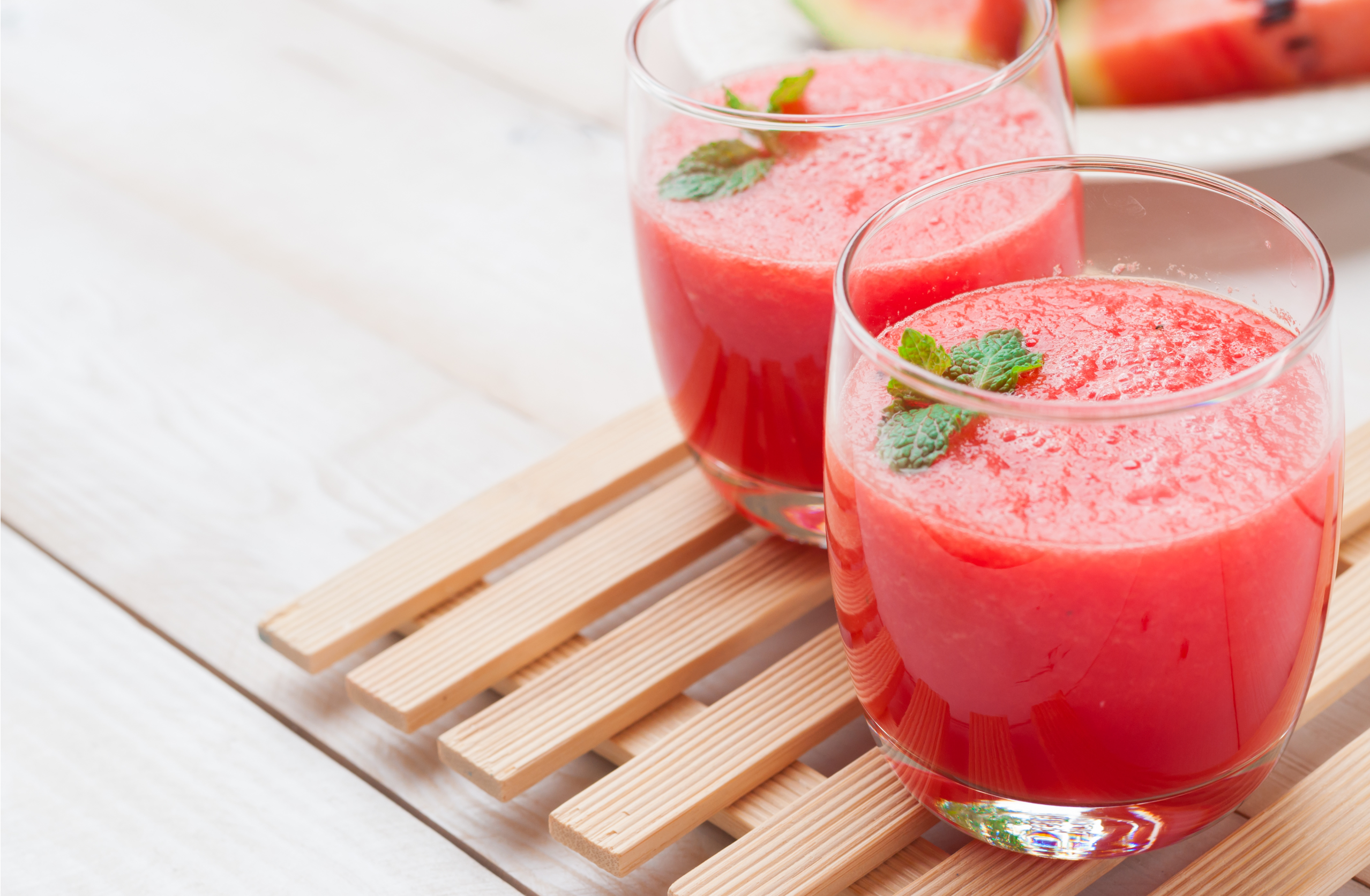 two glasses of watermelon strawberry smoothie