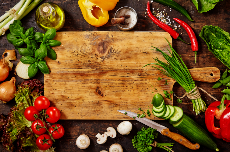 Assortment of Raw Vegetables on Rustic Wood Table