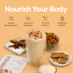 A glass of shake, surrounded by 310 Horchata, cinnamon sticks, almonds, granola and white rice.