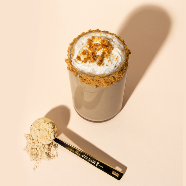 Banana Cream Pie Shake and scoop of protein powder.