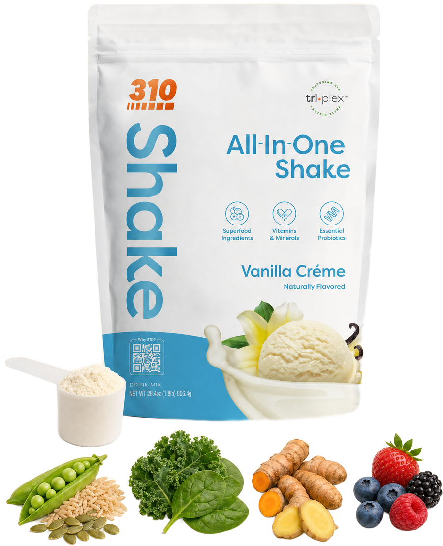 310 All-In-One Shake pouch with a scoop of powder and four groups of ingredients: peas with brown rice and pumpkin seeds, kale and spinach, turmeric and ginger, and mixed berries