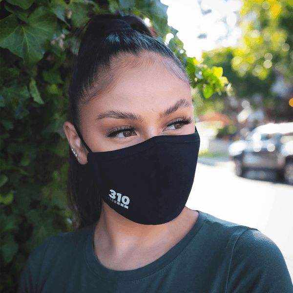 woman wearing a black face mask