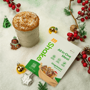 A festive themed 310 Gingerbread Shake and a glass of protein shake.
