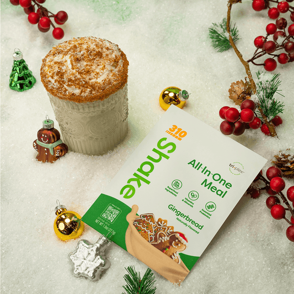 A festive themed 310 Gingerbread Shake and a glass of protein shake.