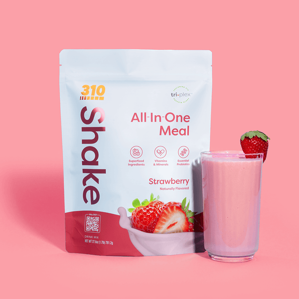 310 Strawberry Shake pack next to a strawberry shake topped with strawberry