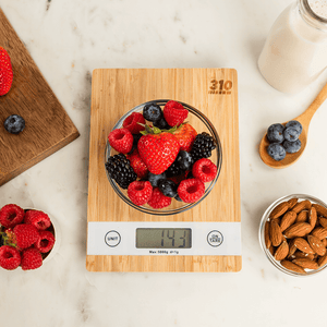 fresh berries on a bamboo food scale