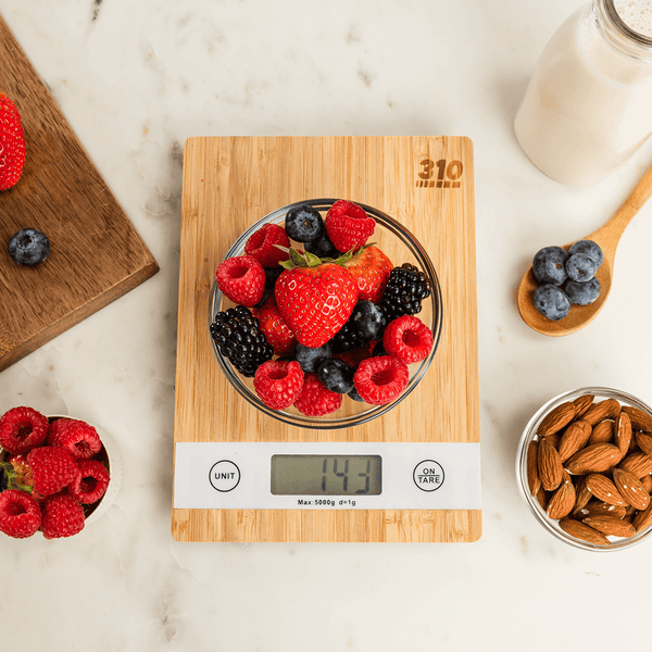 fresh berries on a bamboo food scale