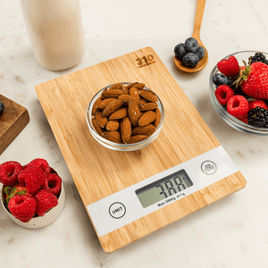 a bowl of almonds on a bamboo food scale