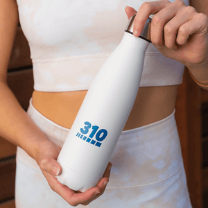 woman holding the 310 cool white hydration bottle