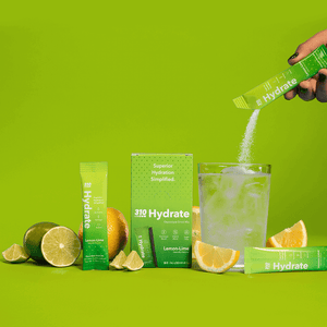 310 lemon-lime, a glass of water and lemons and lime