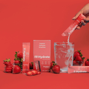 310 hydrate strawberry with fresh strawberries and a glass of water