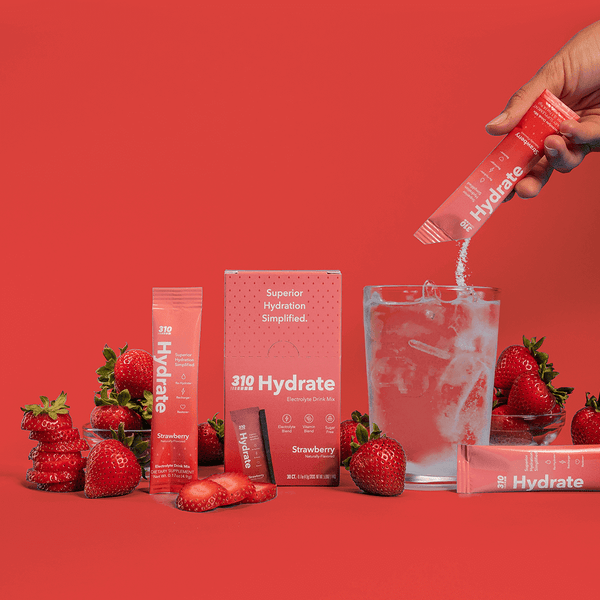 310 hydrate strawberry with fresh strawberries and a glass of water