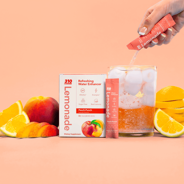 310 peach-punch lemonade with a a glass of water