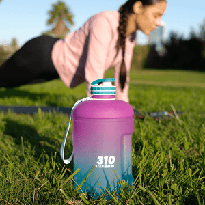 a woman doing plank and a purple/turquoise mega hydration bottle